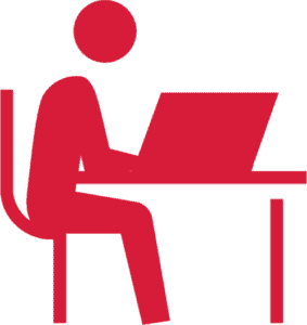 person siddende ved skrivebord ikon