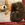 barna kutya egy KONG ágyon barna medvével